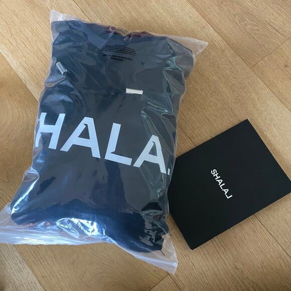 SHALAJ Hoodie in Black - Picture 1 of 9